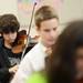 Tappan Middle School eight grader Liam Morast concentrates on his music while playing violin in the orchestra at Tappan on Thursday, Jan. 17. Members of the Tappan band, choir and orchestra are headed to Washington D.C. in June to perform a concert on the steps of the Lincoln Memorial to commemorate the 50th anniversary of Martin Luther King Jr.'s "I have a dream" speech. Melanie Maxwell I AnnArbor.com